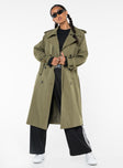 Trench coat Lapel collar, button fastening at front, twin hip pockets, removable waist tie, adjustable buckle cuff, split at back