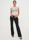 Pants Low-waisted, frill detail-lettuce trim on waits, slightly flared  Elasticated waist 