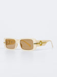 Sunglasses UV 400 Oversized style Rectangle frame Gold-toned detail on arms Moulded nose bridge Beige tinted lenses Lightweight