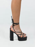 Heels Faux leather material  Strappy upper  Ankle tie fastening  Platform base  Block heel  Square toe 