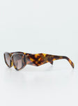 Sunglasses Cat eye shape Tort frames  Slim arms & frame Moulded nose bridge Brown tinted lens