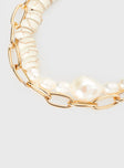 Bracelet set of two pearl and gold toned