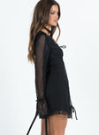 Black mini dress V neckline Tie details throughout