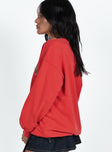 Sweatshirt Crew neckline Drop shoulder  Embroidered graphic Slight stretch Unlined 