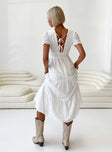 White maxi dress Puff sleeve V neckline Tie fastenings at back Shirred band at back Tiered skirt