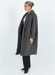 Coat Collared neckline Front button fastening Twin side pockets