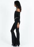 Long sleeve jumpsuit Off the shoulder design Folded neckline Inner silicone strip at bust Good stretch Lined bust