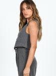 Vest top Pinstripe print V neckline Button fastening at front Faux pockets Pointed hem