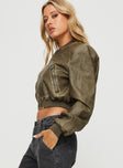 Faux leather cropped bomber Twin hip pockets with zip fastenings, ribbed hems, zip fastening at front  Non-stretch, fully lined