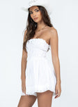 Strapless romper Lace details Ruffle neckline  Adjustable tie at neckline  Shirred back  Twin hip pockets 