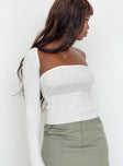 Two piece top Knit material Strapless tube top Matching long sleeve bolero Good stretch Unlined 