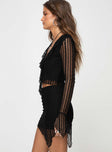 Matching set Slim-fitting long-sleeve crop top, V-neckline, lace material, ruffle detailing Slight stretch, lined body  Slim-fitting mini skirt, asymmetric lace hem Elasticated waistband