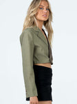 Cropped blazer Two-toned design Lapel collar Button fastening at front Single chest pocket Faux buttons at cuff