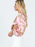 Long sleeve crop top Princess Polly Exclusive Printed design  Can be worn on or off the shoulder  Elasticated edges  Tie front fastening  Puff sleeves 