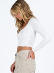 White long sleeve top V neckline Pinched detail at bust Good stretch Mesh lined front