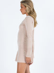 Long sleeve mini dress Knit material Scooped neckline Frill hemline Good stretch Unlined 