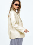 PU Blazer cream colored Faux leather material Lapel collar Button fastening at front Faux chest pocket Twin hip pockets Three button cuff