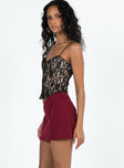 Mini skirt Mid low rise  V front waistline  Invisible zip fastening at side