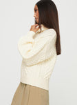 Turtle neck cable sweater Drop shoulder, ribbed cuff and waistband Good stretch, unlined 