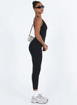 Black jumpsuit Ribbed material Scooped neckline Adjustable shoulder straps Good stretch Unlined 