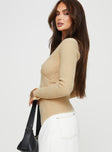 Sweater  Knit-like material, cross over design, v-neckline, long sleeve Good stretch, unlined 