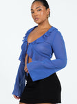 Blue long sleeve top Sheer material Frill neckline & hem Tie fastening at bust Flared sleeves Non stretch Unlined