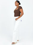 White jeans Cotton High rise White denim Belt looped waist Zip and button fastening Four pocket design Embroidered graphic at back Wide leg