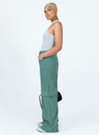 Green pants Cord material  Zip & button fastening  Belt looped waist  Four pocket design  Faux flap pockets on leg  Wide leg 