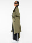 Trench coat Lapel collar, button fastening at front, twin hip pockets, removable waist tie, adjustable buckle cuff, split at back