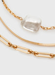 Gold-toned necklace Pack of three seperate chains, lobster clasp fastening, pearl detail