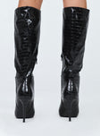 Boots Faux croc leather  Knee-high  Stilleto style heel Pointed toe  Padded inside 