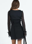 Black mini dress V neckline Tie details throughout