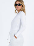 White long sleeve bodysuit High neckline Cheeky style bottom Press clip fastening  Good stretch