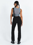 Black slim fitting pants High rise Zip and button fastening Invisible zip at cuff Good stretch