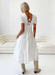 White maxi dress Puff sleeve V neckline Tie fastenings at back Shirred band at back Tiered skirt