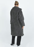 Coat Collared neckline Front button fastening Twin side pockets