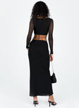 Matching set Kristen is wearing a size US 2 / AU 6 Mesh material Long sleeve crop top V-neckline Clasp fastening at front Maxi skirt Elasticated waistband  Good stretch Lined body