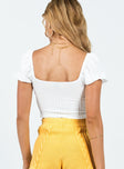 Crop top Textured material Puff sleeve  Adjustable keyhole cutout with tie fastening Split hem  Good stretch Lined bust