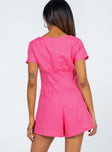 Romper 80% linen Button front fastening V neckline Twin hip pockets Pinched stitching through waist Relaxed through thigh