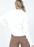 White jumper Knit material  Drop shoulder Fixed rolled cuffs 