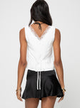 V neck top Button fastening down front, lace trim, wide shoulder straps Waist tie at the back 