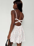 Romper Floral print Adjustable shoulder straps V neckline Elasticated straps at back Low back