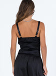 Black crop top Silky material Adjustable shoulder straps Scooped neckline Non stretch Lined bust