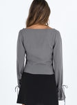 Grey long sleeve top Sheer design  Wide neckline  Detailed trimming  Button front fastening  Tie fastening at cuffs