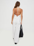 Matching set Pinstripe print, halter neck open back style, belt looped waist, zip and button fastening 