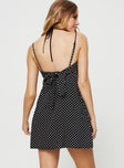 Polka dot print mini dress V neck, gathered detail at bust, adjustable shoulder straps, tie fastening at back, elasticated back