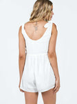 Romper Adjustable tie shoulder straps Scooped neckline Invisible zip fastening at side Twin hip pockets