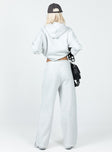 Track pants Elasticated drawstring waist  Twin hip pockets  Wide leg  Soft lining 