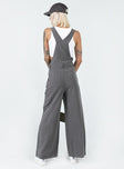 Overalls Pinstripe print  Adjustable shoulder straps  Chest pocket  Belt looped waist  Invisible zip fastening at side  Four-pocket design  Wide leg 