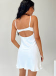 Mini dress Silky material  Lace trimming  Adjustable shoulder straps  Wired cups  Clasp fastening at back  Low cut back 